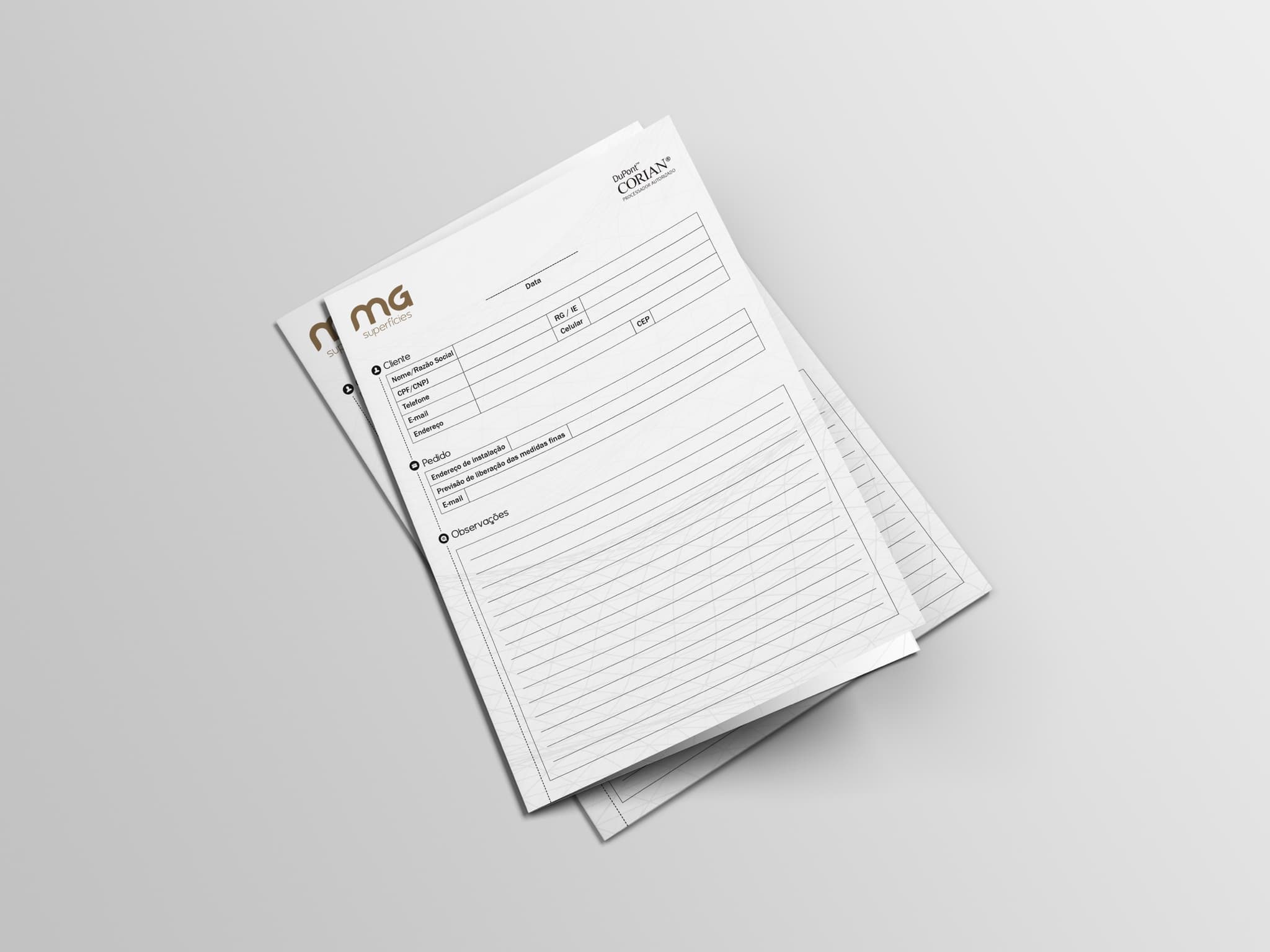Capa do folder da MG Superfícies em papel branco com a marca