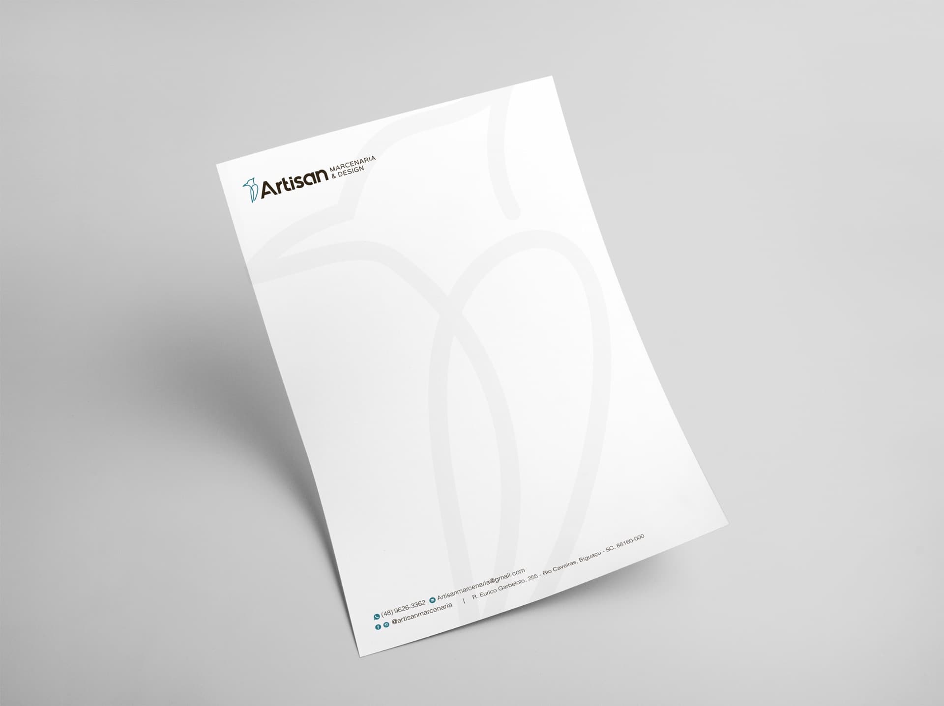 Papel timbrado da Artisan com o símbolo em marca d'água