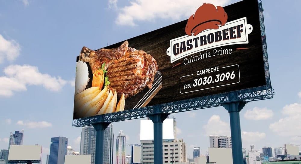 Outdoor da GastroBeef com cortes assados sobre a chapa e o telefone de reservas