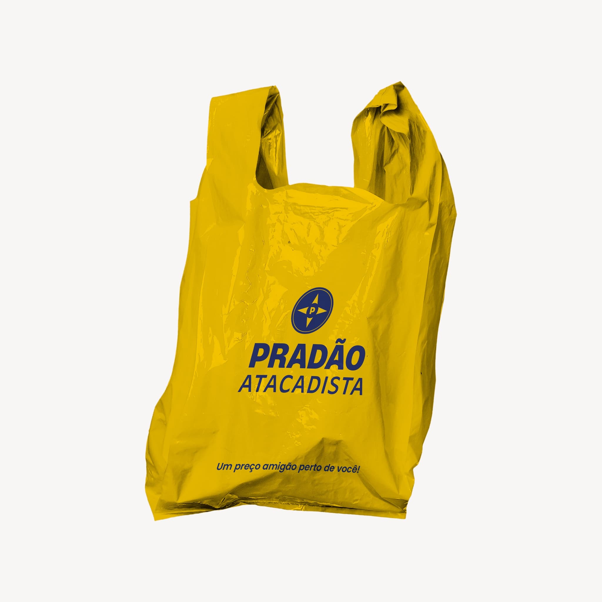 Sacola plástica amarela com a marca Pradão Atacadista